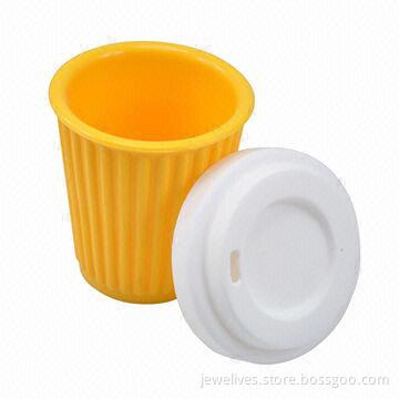 Bright yellow silicone coffee cup